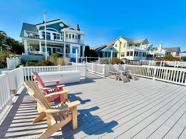 a view of balcony with wooden floor