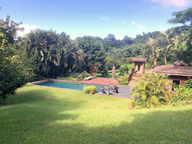 a view of a swimming pool with an outdoor space and seating area