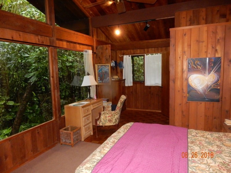 141 Kapuai Road Haiku, HI 96708 - Photo 11 of 15 a balcony with table and chairs