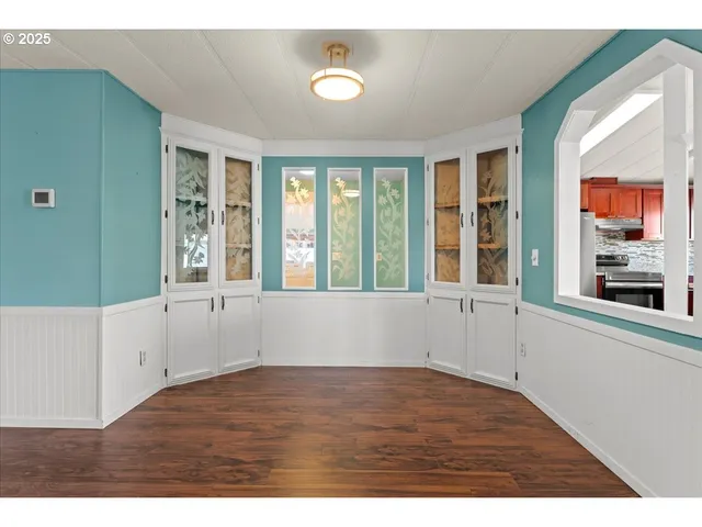 a view interior of a house wooden floor and windows
