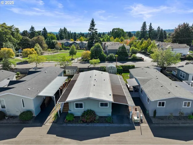 an aerial view of a house with a garden