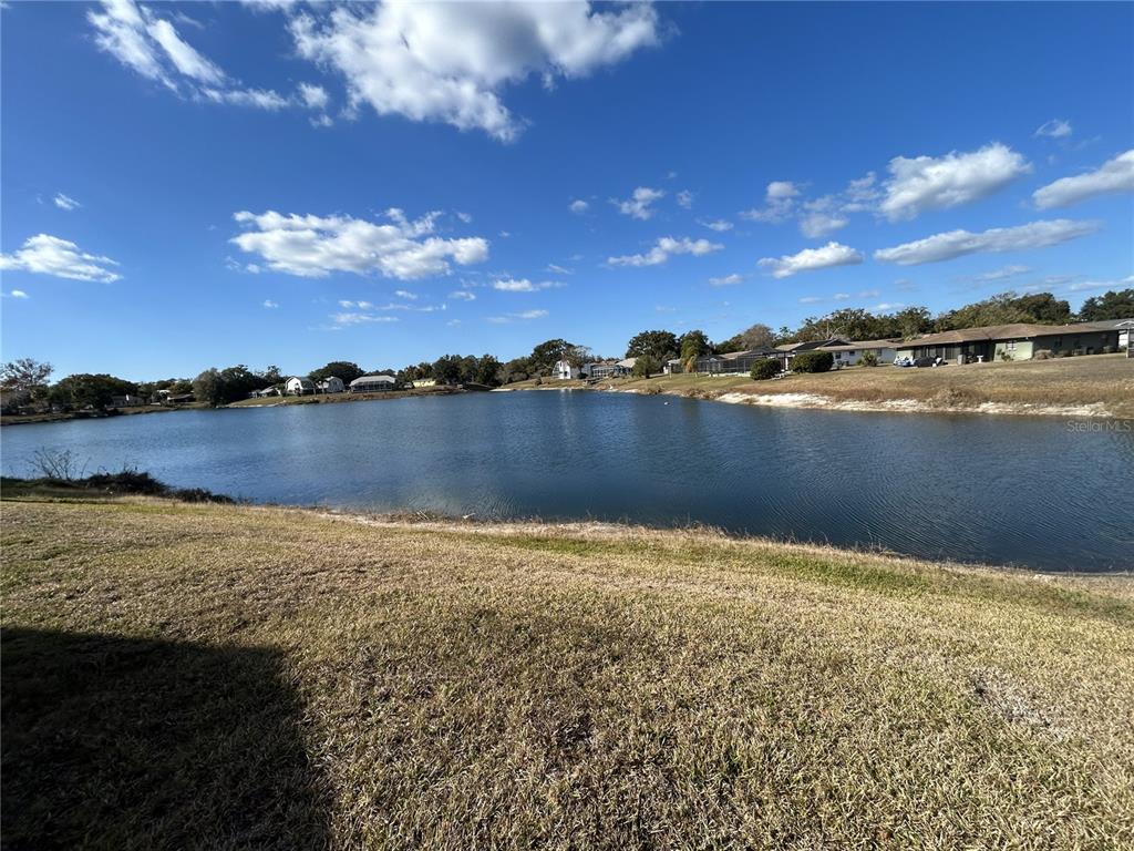 8807 Heather Boulevard Weeki Wachee, FL 34613 - Photo 2 of 7 a view of a lake in a sunset