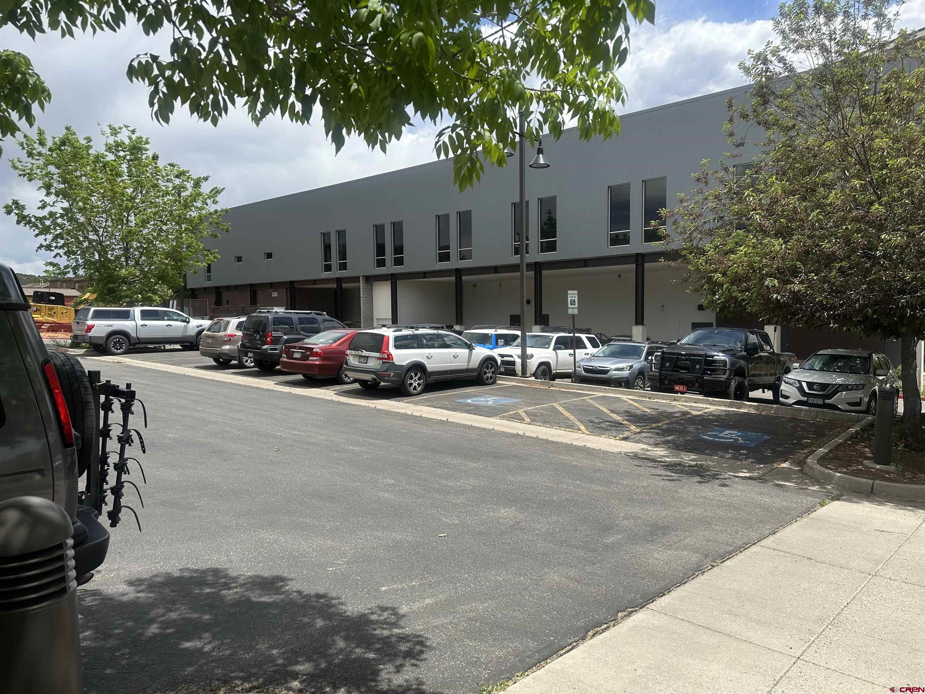 175 Mercado Street, Unit 225 Durango, CO 81301 - Photo 19 of 22 a cars parked in front of a building