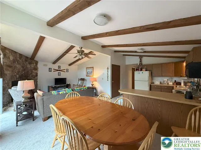 a view of a dining room with furniture