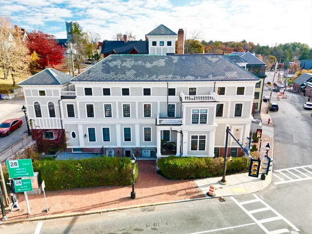 a view of building with yard