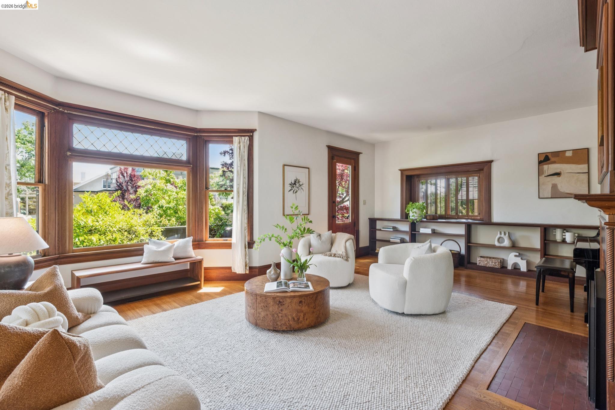 1490 Arch Street Berkeley, CA 94708 - Photo 7 of 57 a living room with furniture and a large window