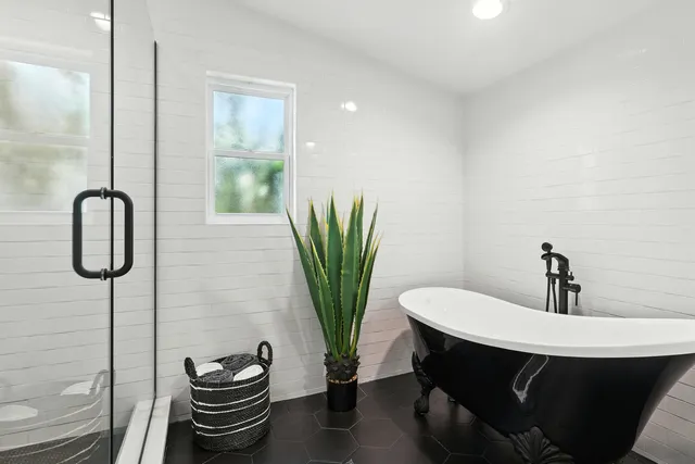 a view of a house with a swimming pool and a yard