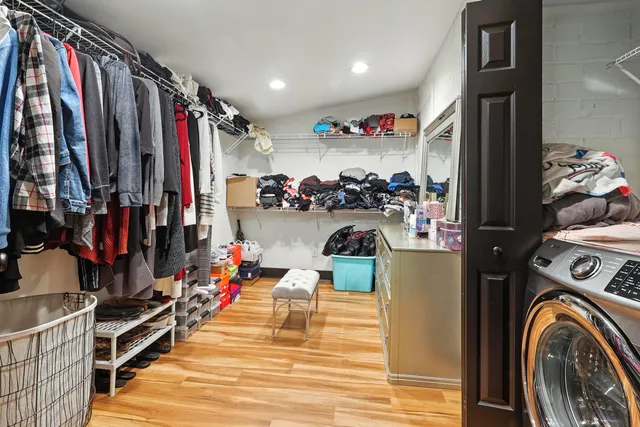 a view of a patio with table and chairs and potted plants