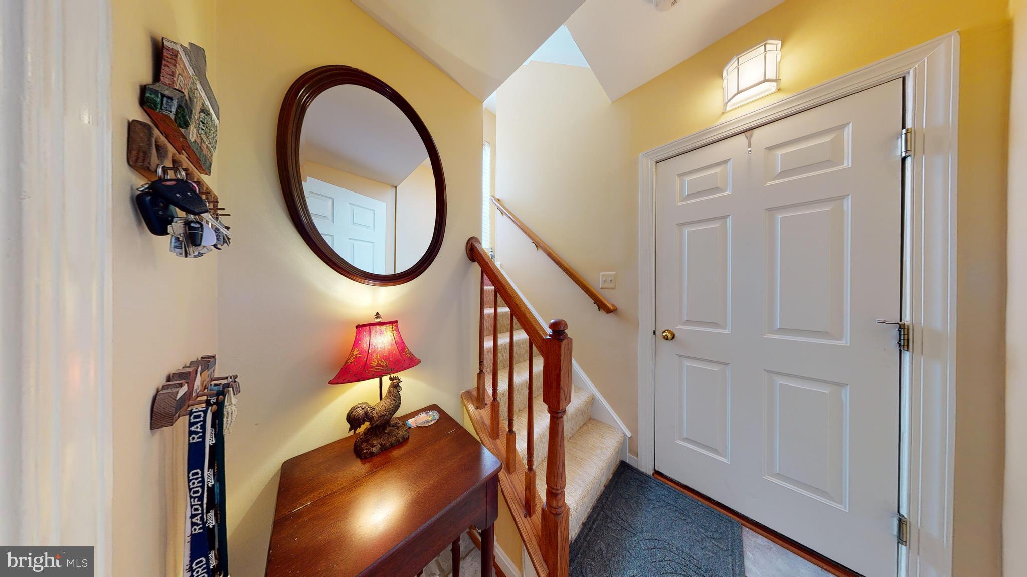 1880 Crescent Park Drive Reston, VA 20190 - Photo 40 of 51 a view of entryway and hall with wooden floor
