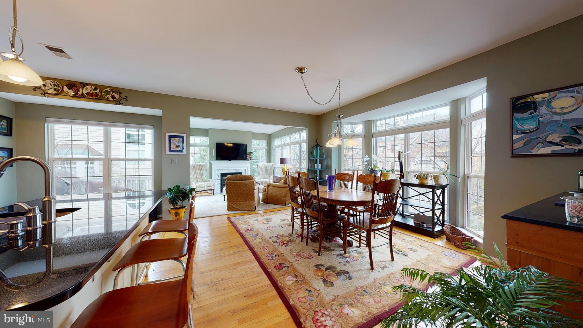 1880 Crescent Park Drive Reston, VA 20190 - Photo 9 of 51 a view of a dining room with furniture window and wooden floor