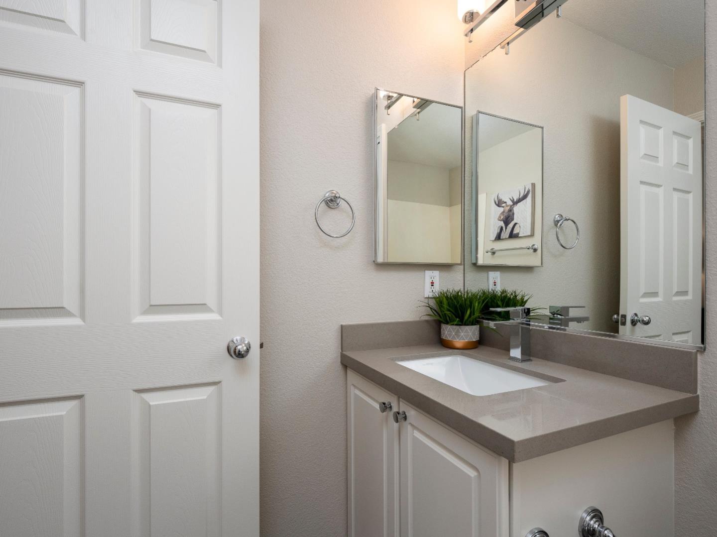 935 Old County Road, Unit 45 Belmont, CA 94002 - Photo 11 of 18 a bathroom with a sink and a mirror