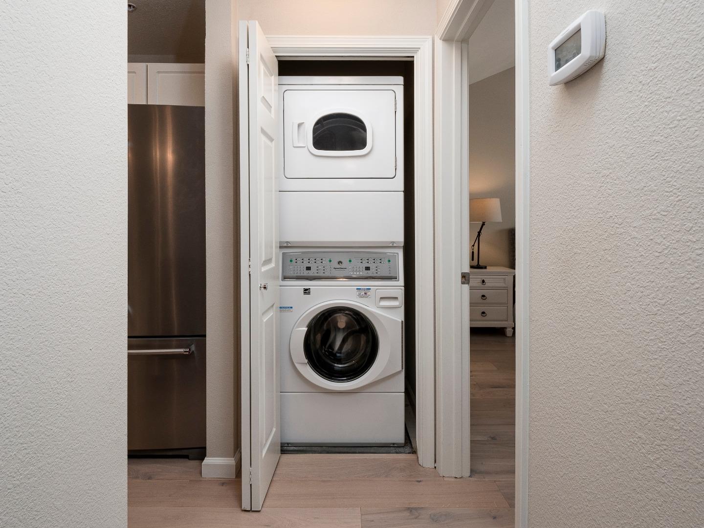 935 Old County Road, Unit 45 Belmont, CA 94002 - Photo 13 of 18 a utility room with dryer and washer