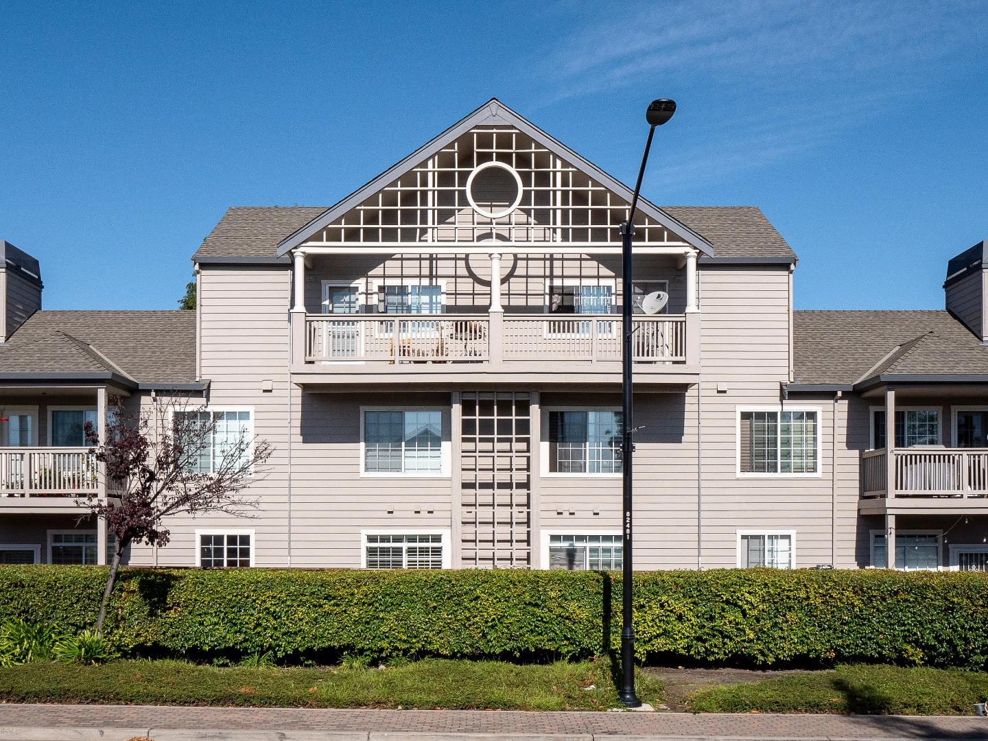 935 Old County Road, Unit 45 Belmont, CA 94002 - Photo 14 of 18 a front of a house with a yard