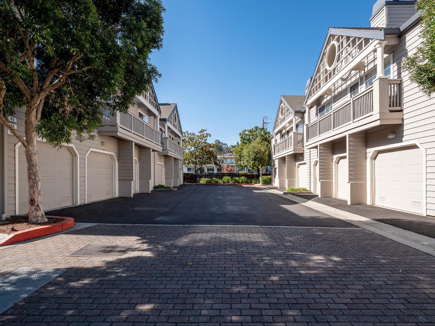 935 Old County Road, Unit 45 Belmont, CA 94002 - Photo 16 of 18 a street view along with residential houses