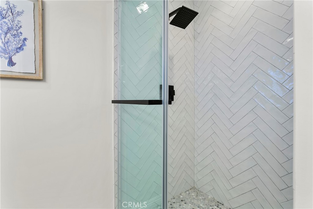 21066 Poolside Lane Huntington Beach, CA 92648 - Photo 18 of 31 a bathroom with a shower