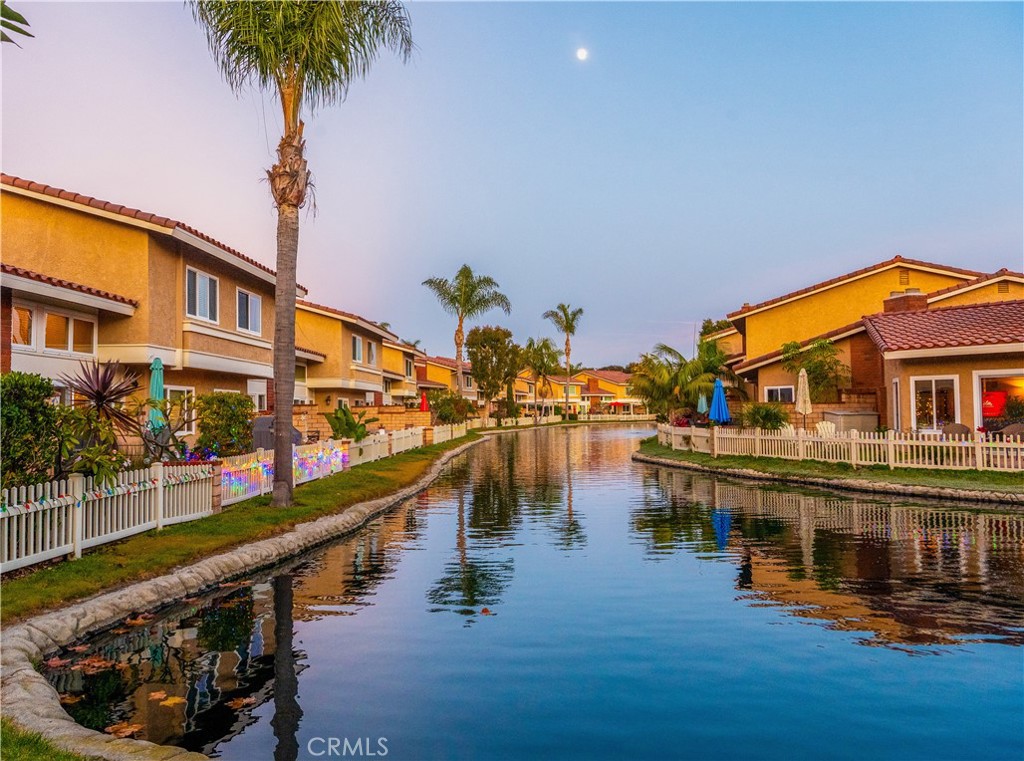 21066 Poolside Lane Huntington Beach, CA 92648 - Photo 28 of 31 a view of a lake with a ocean view