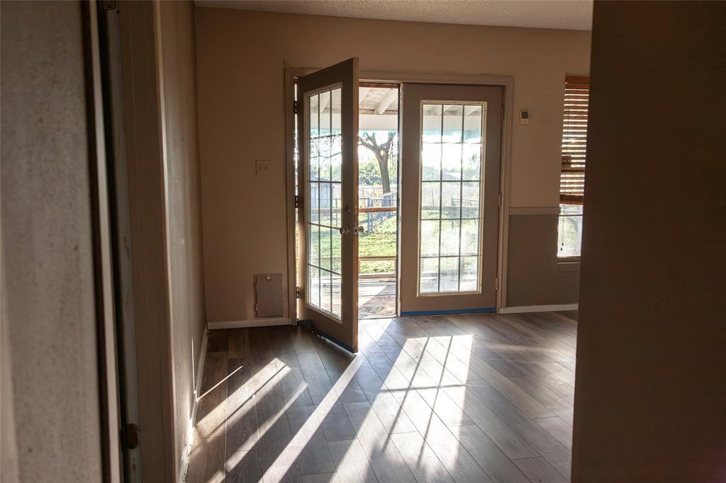 112 Southeast Front Street, Unit A Bailey, TX 75452 - Photo 13 of 39 Entryway featuring wood finished floors and french doors