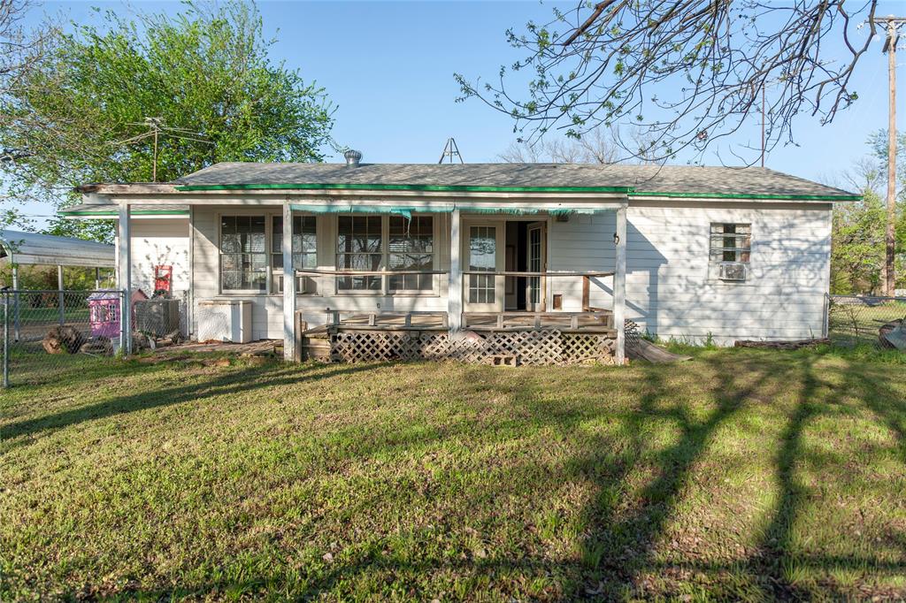 112 Southeast Front Street, Unit A Bailey, TX 75452 - Photo 14 of 39 Rear view of property featuring covered porch