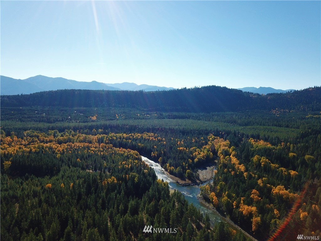 320 Kokanee Loop Cle Elum, WA 98922 - Photo 11 of 14 a view of a street with a forest