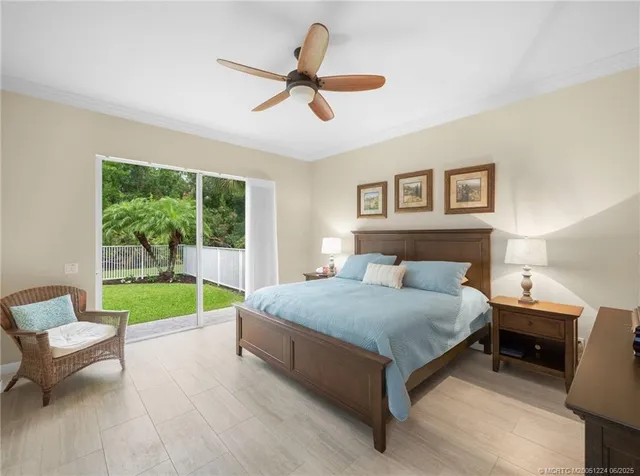 a bedroom with a bed and a view of bedroom