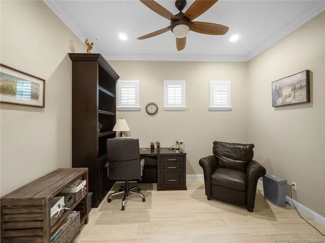 a work room with furniture and a window
