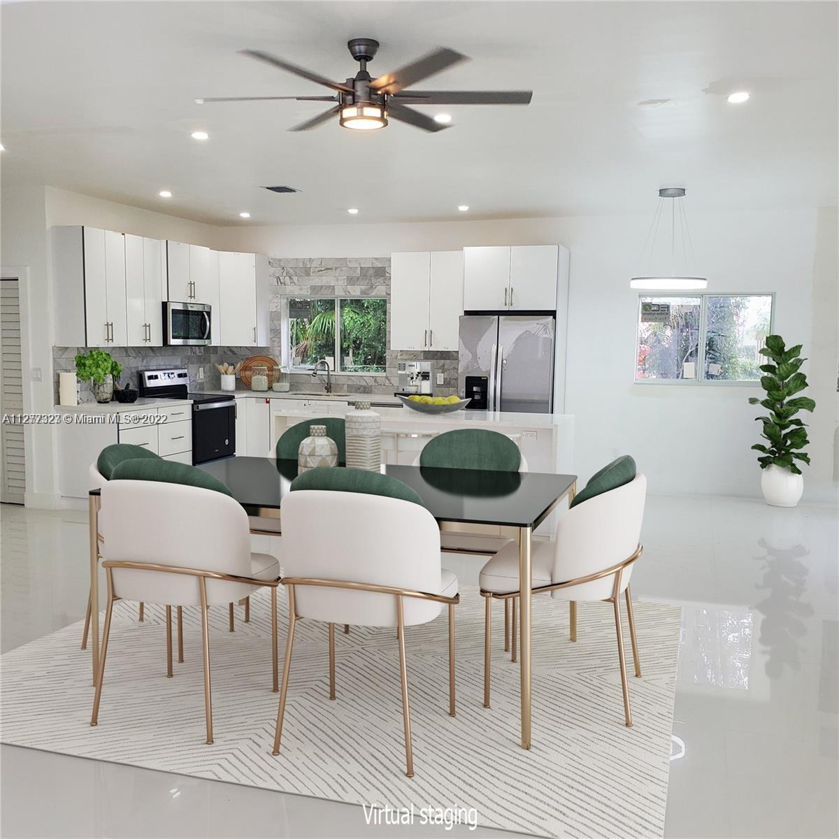 35220 Southwest 213th Avenue Homestead, FL 33034 - Photo 12 of 46 OPEN KITCHEN WITH ISLAND