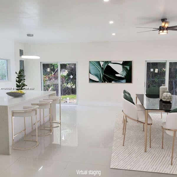 35220 Southwest 213th Avenue Homestead, FL 33034 - Photo 13 of 46 OPEN KITCHEN WITH ISLAND/FAMILY ROOM