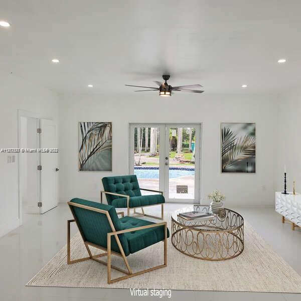 35220 Southwest 213th Avenue Homestead, FL 33034 - Photo 14 of 46 MASTER BEDROOM GRAND ROOM WITH POOL VIEW