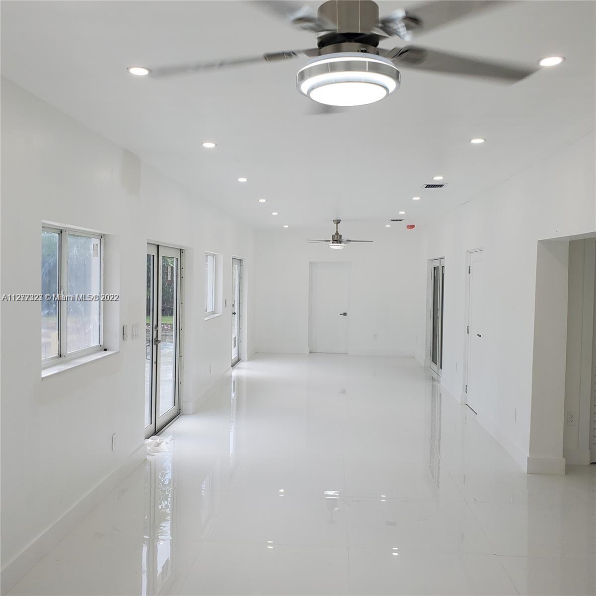 35220 Southwest 213th Avenue Homestead, FL 33034 - Photo 24 of 46 LOBBY/ENTAIMENT AREA WITH POOL VIEW
