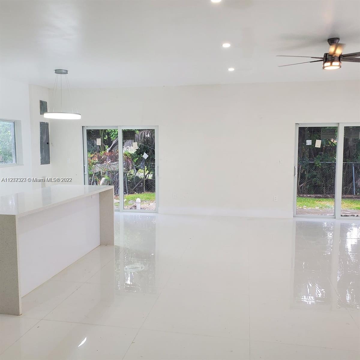 35220 Southwest 213th Avenue Homestead, FL 33034 - Photo 30 of 46 OPEN KITCHEN WITH ISLAND