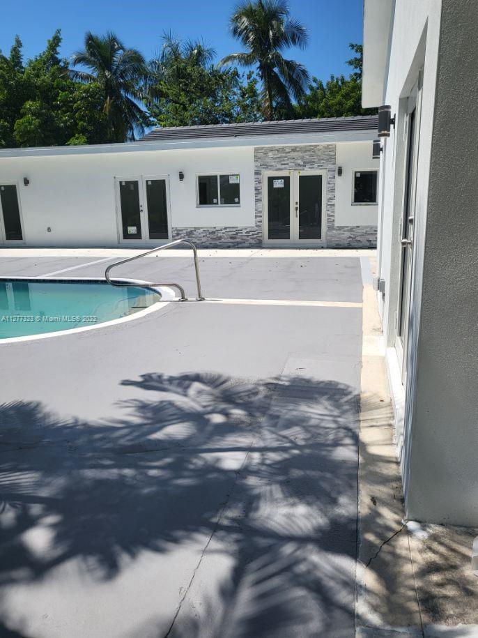 35220 Southwest 213th Avenue Homestead, FL 33034 - Photo 3 of 46 EXTERIOR FRONT ENTRANCE & NEW POOL DECK