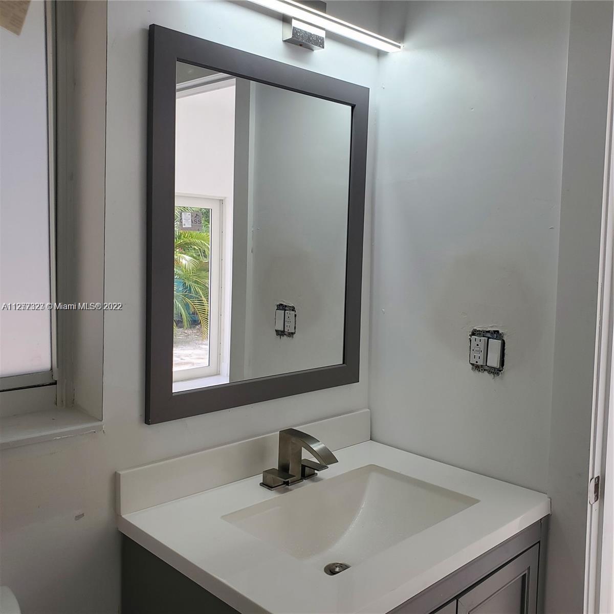 35220 Southwest 213th Avenue Homestead, FL 33034 - Photo 46 of 46 POOL/GUEST HOUSE BATHROOM