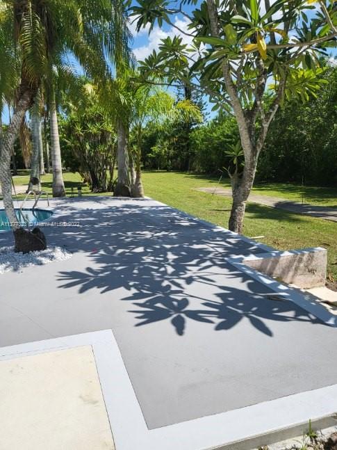 35220 Southwest 213th Avenue Homestead, FL 33034 - Photo 6 of 46 NEW POOL DECK
