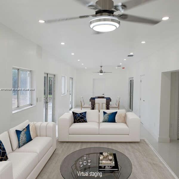 35220 Southwest 213th Avenue Homestead, FL 33034 - Photo 9 of 46 LOBBY WITH POOL VIEW