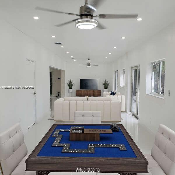 35220 Southwest 213th Avenue Homestead, FL 33034 - Photo 10 of 46 LOBBY/GAME AREA WITH POOL VIEW