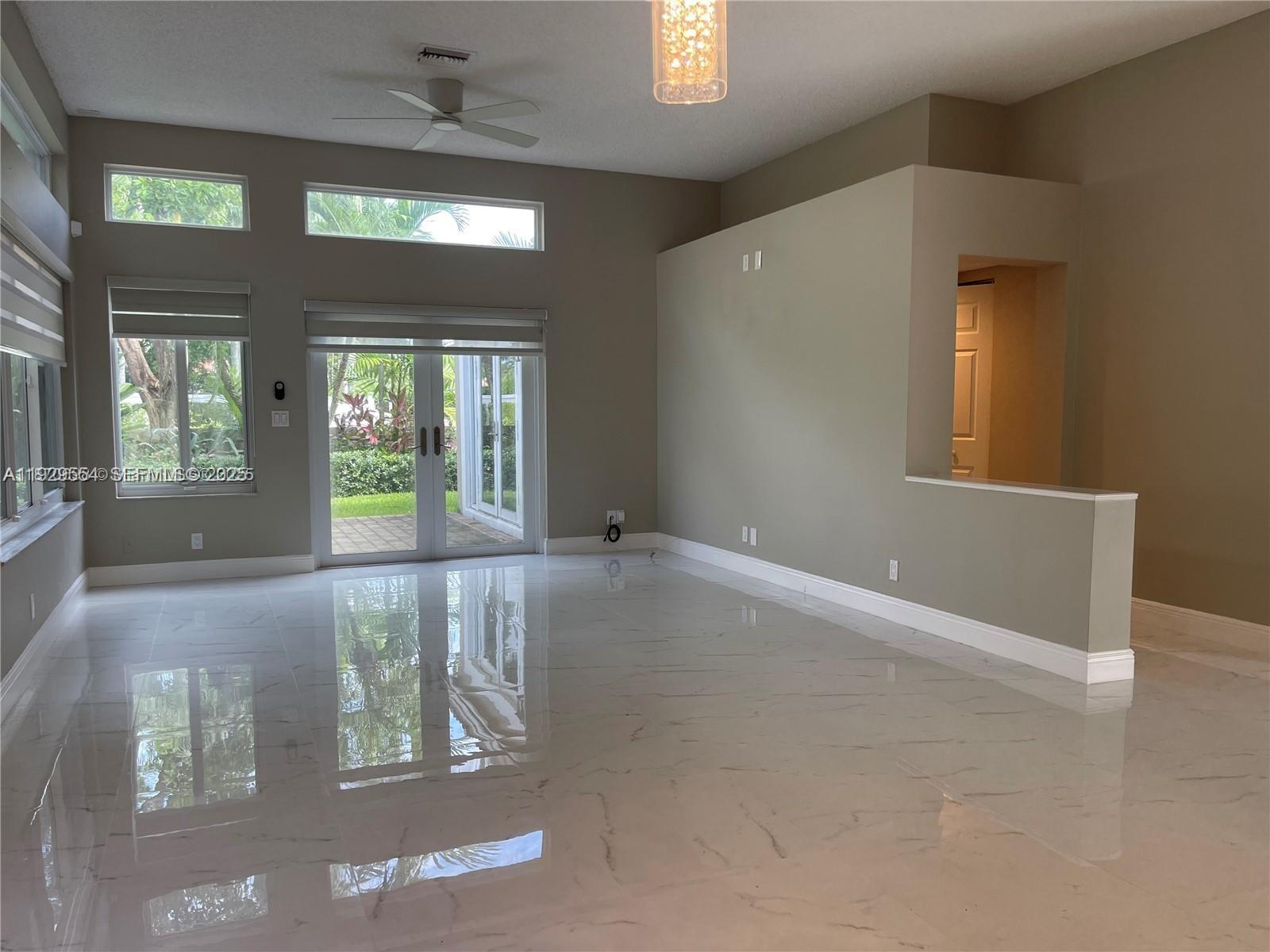 10101 Northwest 5th Street, Unit 10101 Plantation, FL 33324 - Photo 11 of 29 a view of an entryway with a livingroom