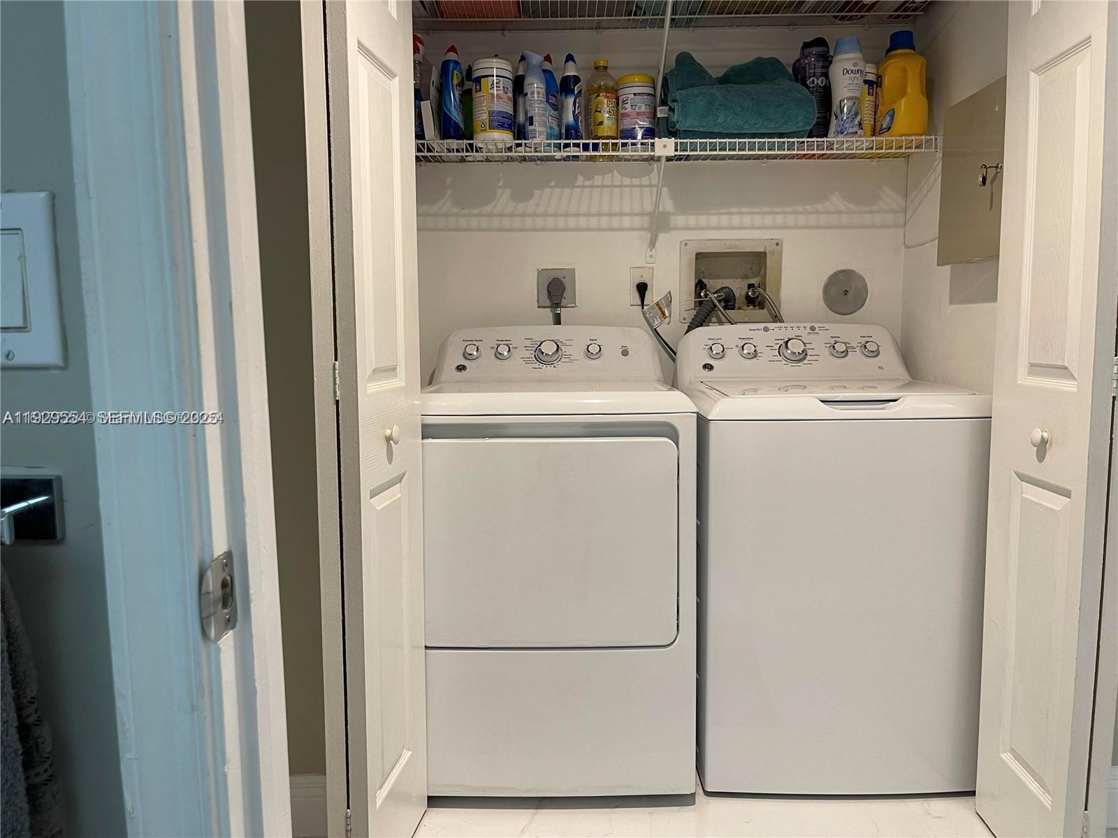 10101 Northwest 5th Street, Unit 10101 Plantation, FL 33324 - Photo 26 of 29 a utility room with dryer and washer