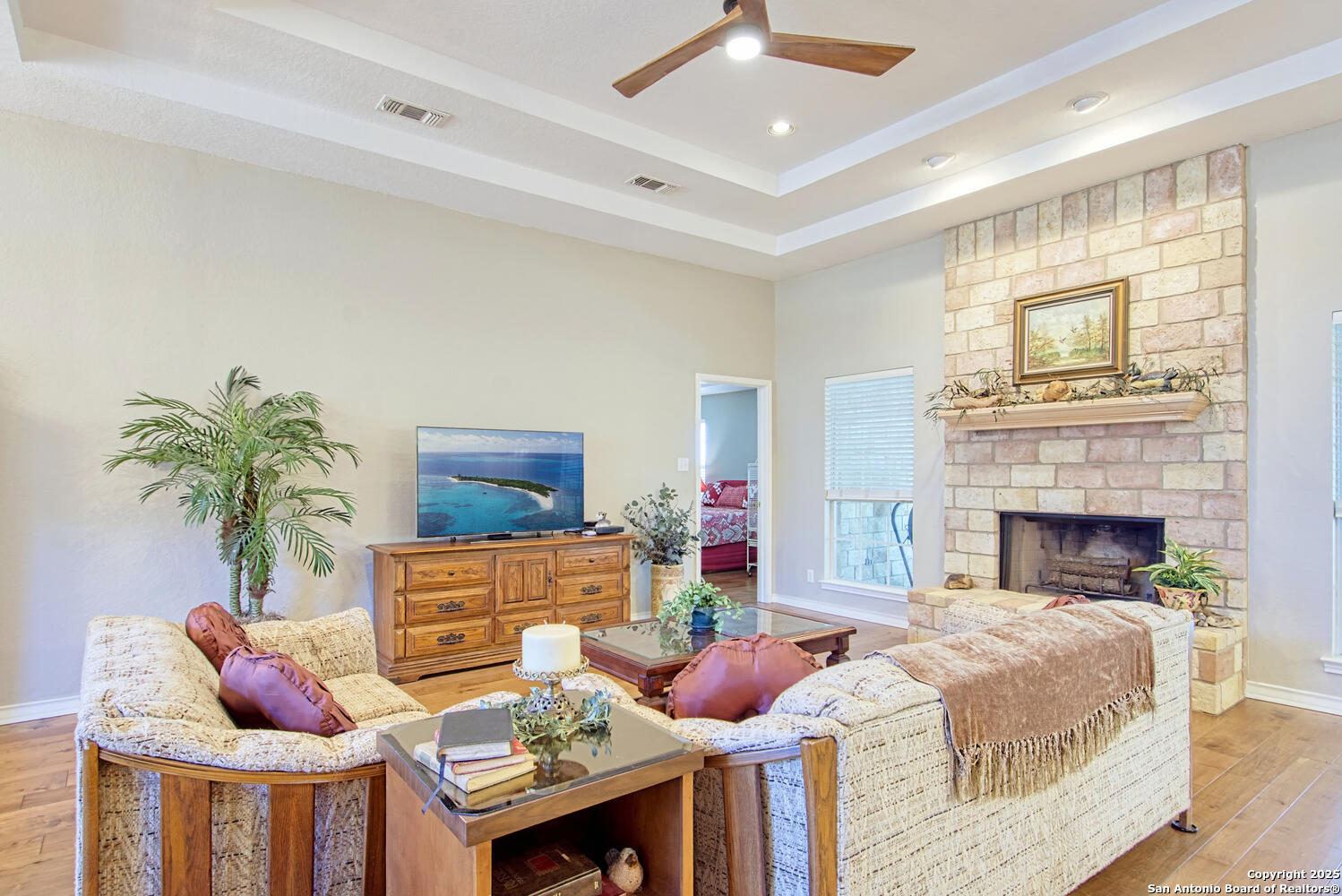 15260 Miller Road St. Hedwig, TX 78152 - Photo 15 of 48 a living room with furniture and a fireplace