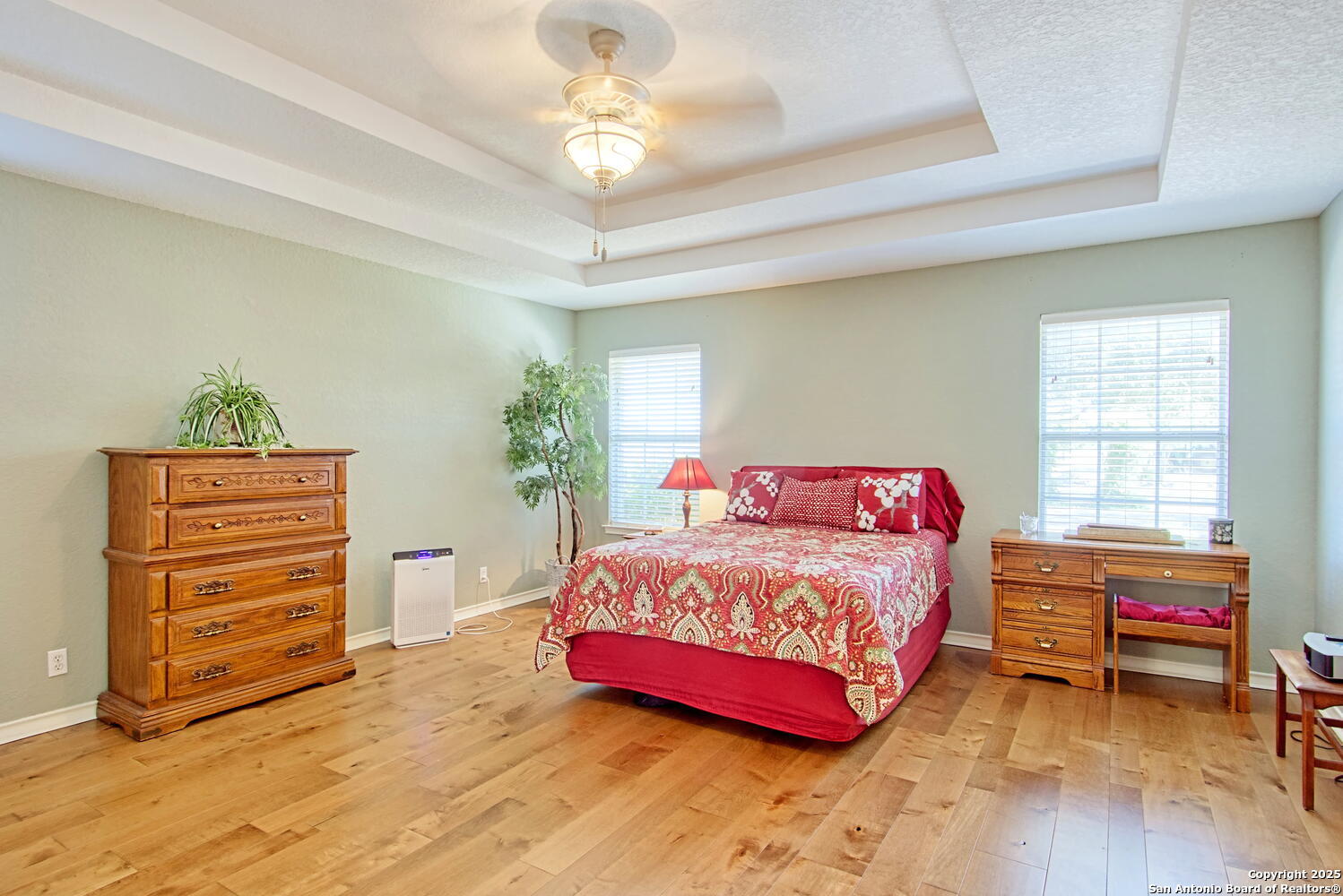 15260 Miller Road St. Hedwig, TX 78152 - Photo 27 of 48 a bedroom with a bed and a chandelier