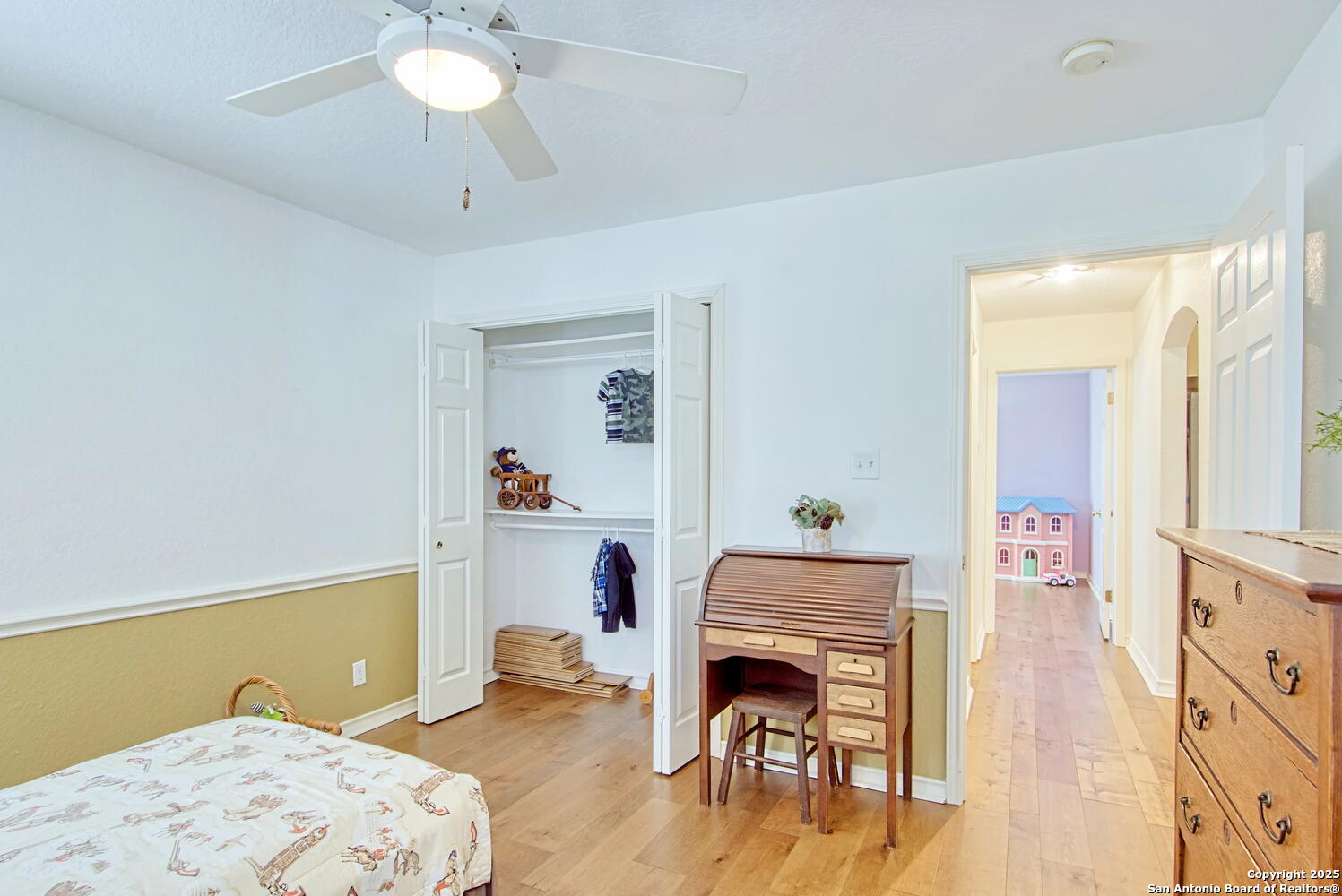 15260 Miller Road St. Hedwig, TX 78152 - Photo 33 of 48 a bedroom with a bed and a chandelier