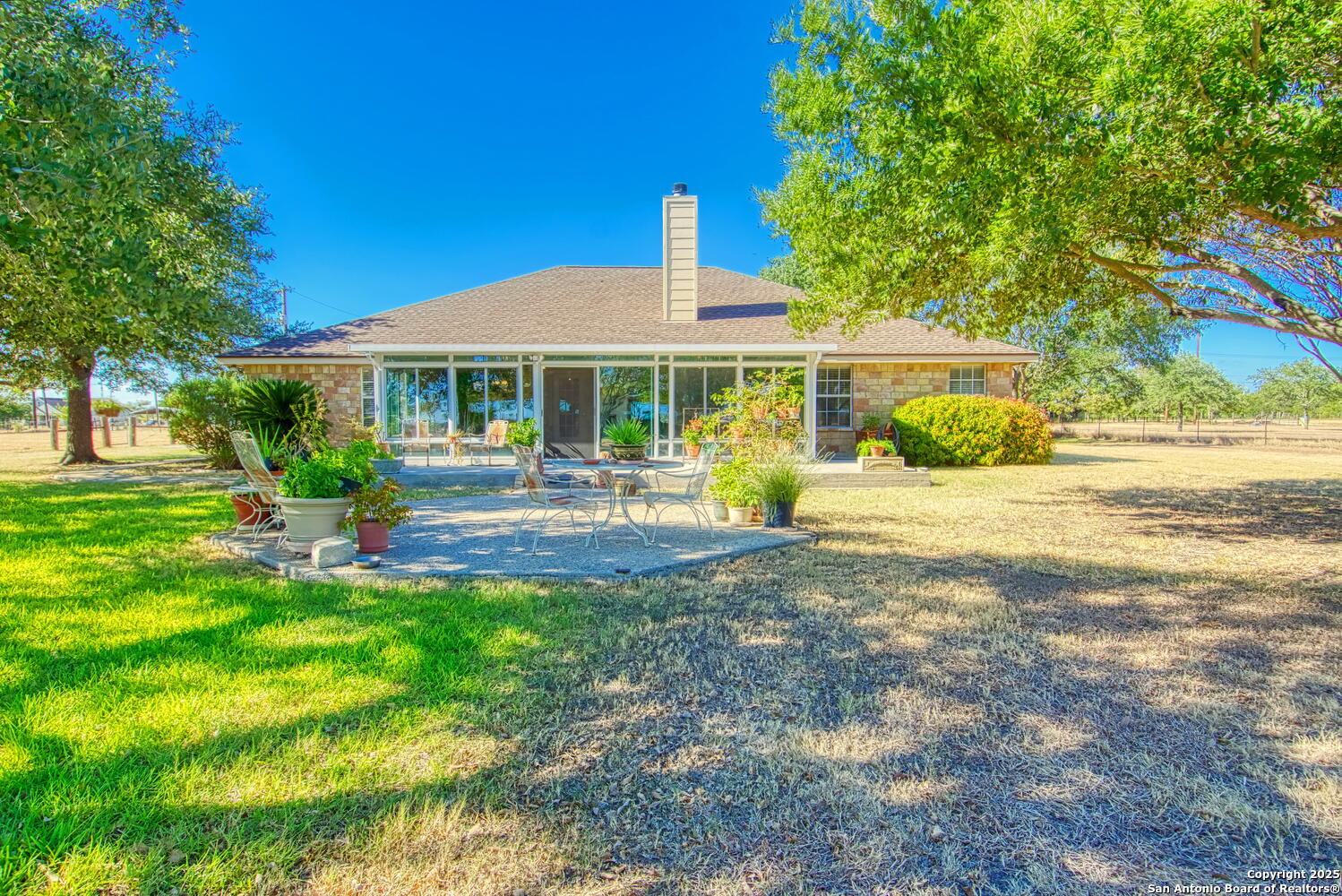 15260 Miller Road St. Hedwig, TX 78152 - Photo 40 of 48 a front view of a house with a yard