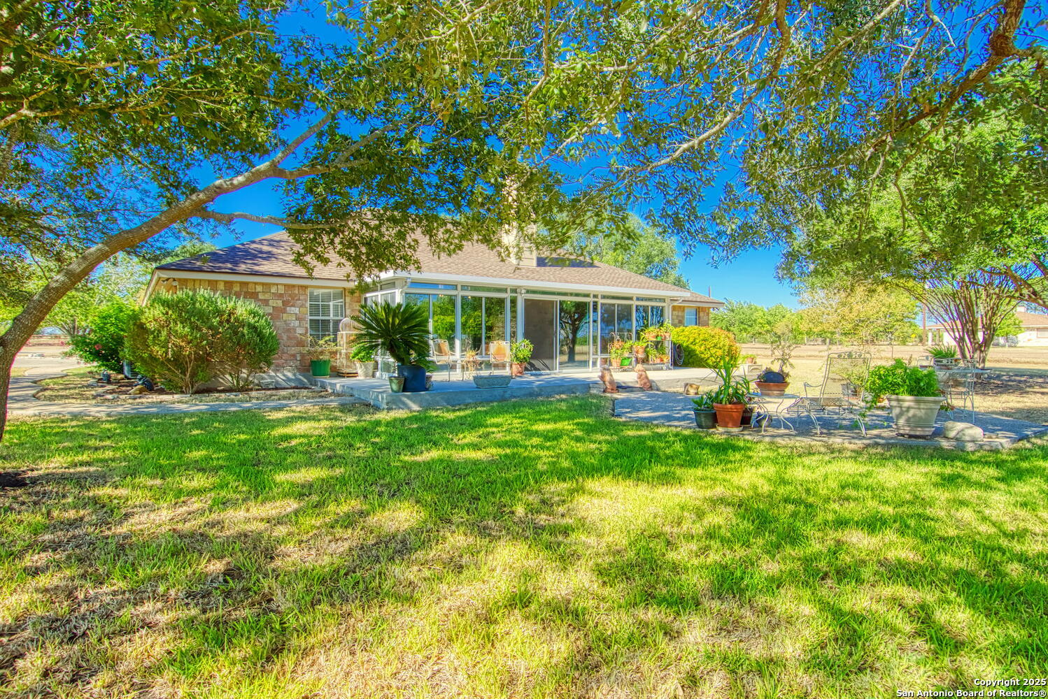 15260 Miller Road St. Hedwig, TX 78152 - Photo 41 of 48 a view of a house with a big yard