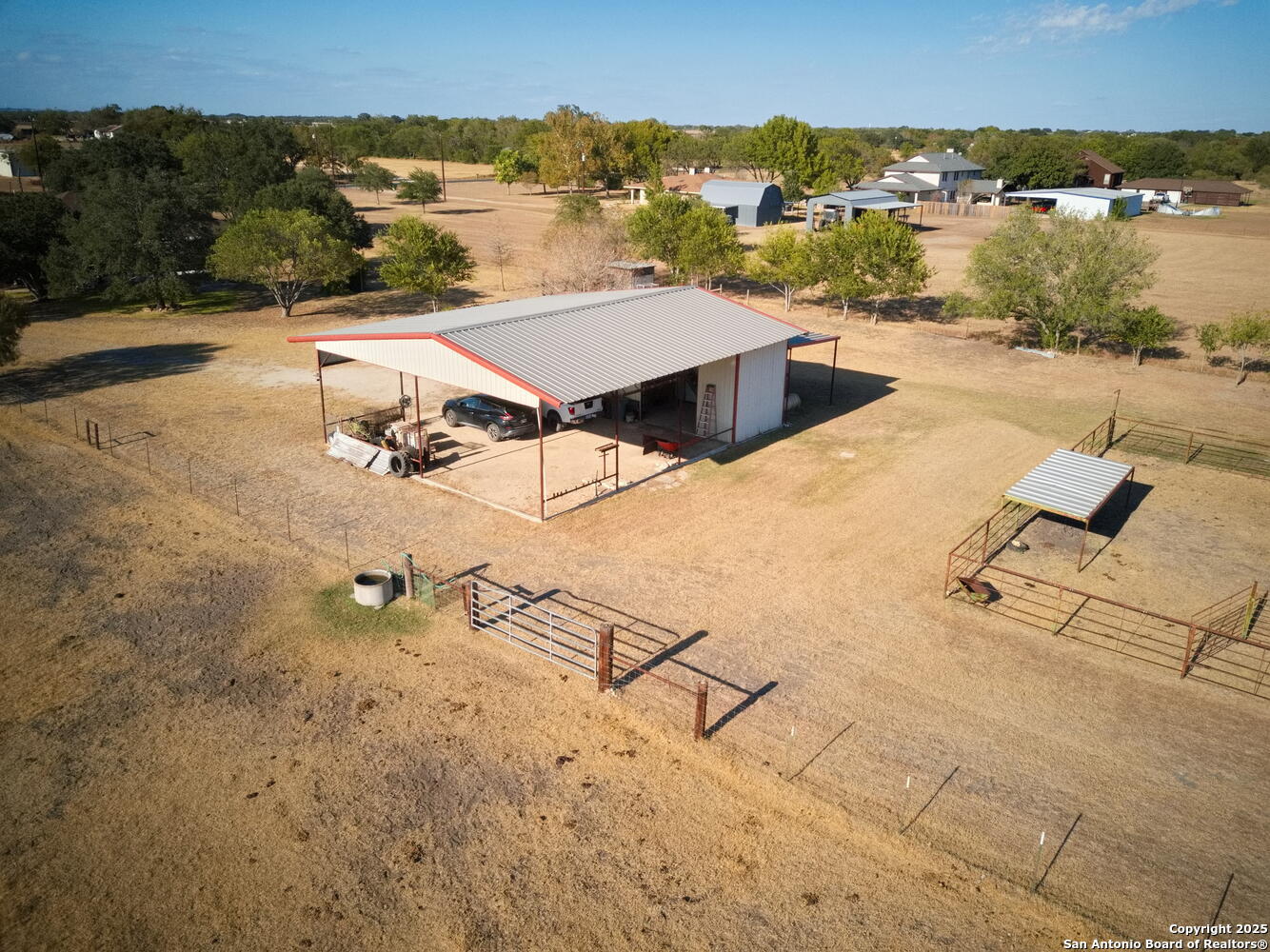 15260 Miller Road St. Hedwig, TX 78152 - Photo 47 of 48 an aerial view of a residential houses with outdoor space