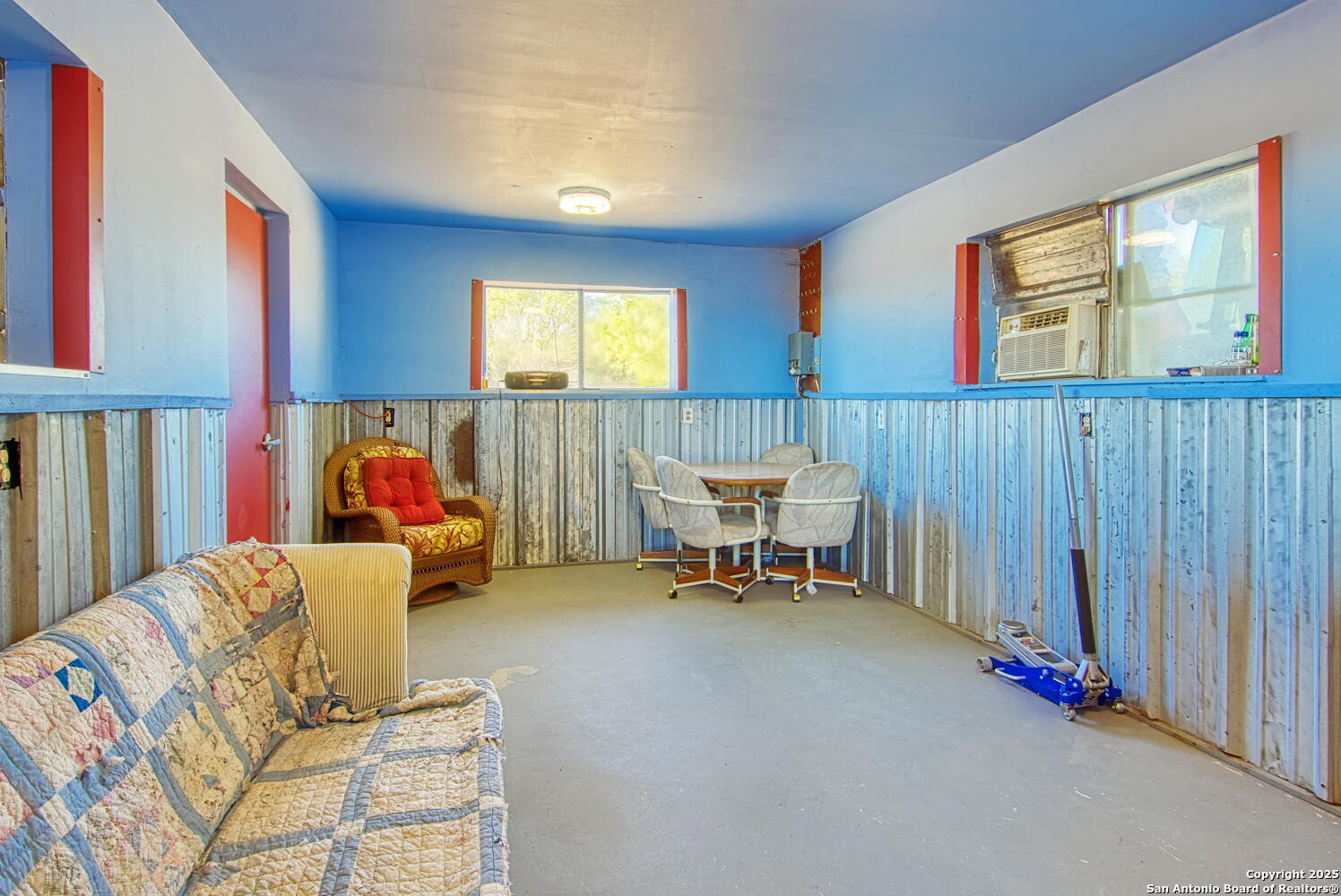 15260 Miller Road St. Hedwig, TX 78152 - Photo 6 of 48 a bed room with furniture and a window