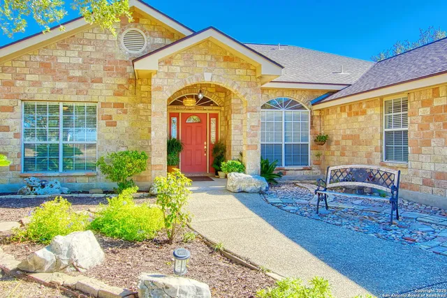 a view of front door with hallway