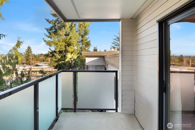 a view of balcony with a potted plant