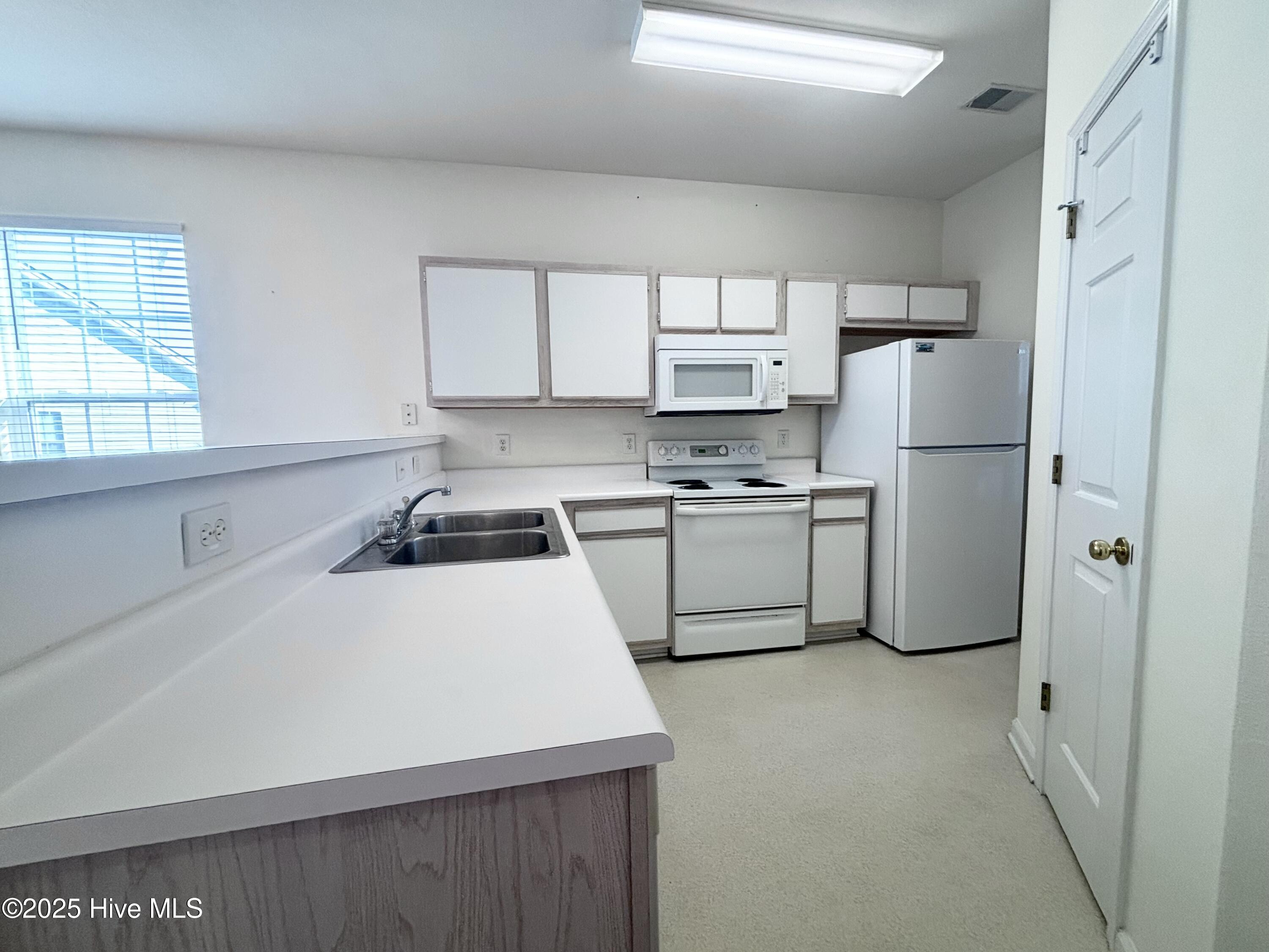 7509 Moorhen Lane Southwest, Unit 52D Sunset Beach, NC 28468 - Photo 15 of 39 Kitchen 2