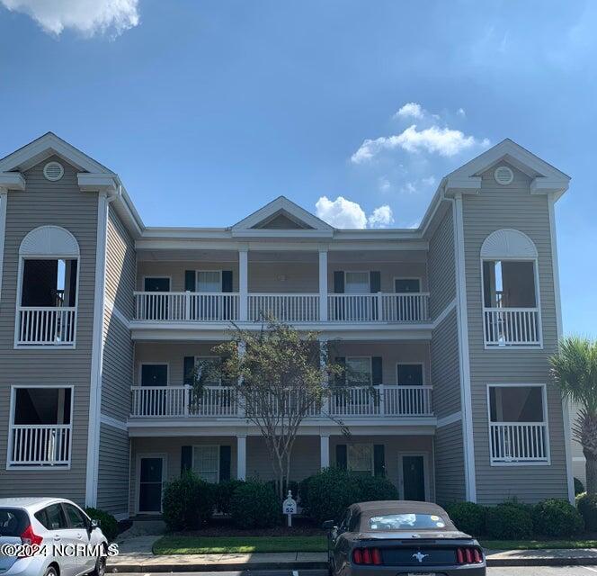 7509 Moorhen Lane Southwest, Unit 52D Sunset Beach, NC 28468 - Photo 2 of 39 Front of building