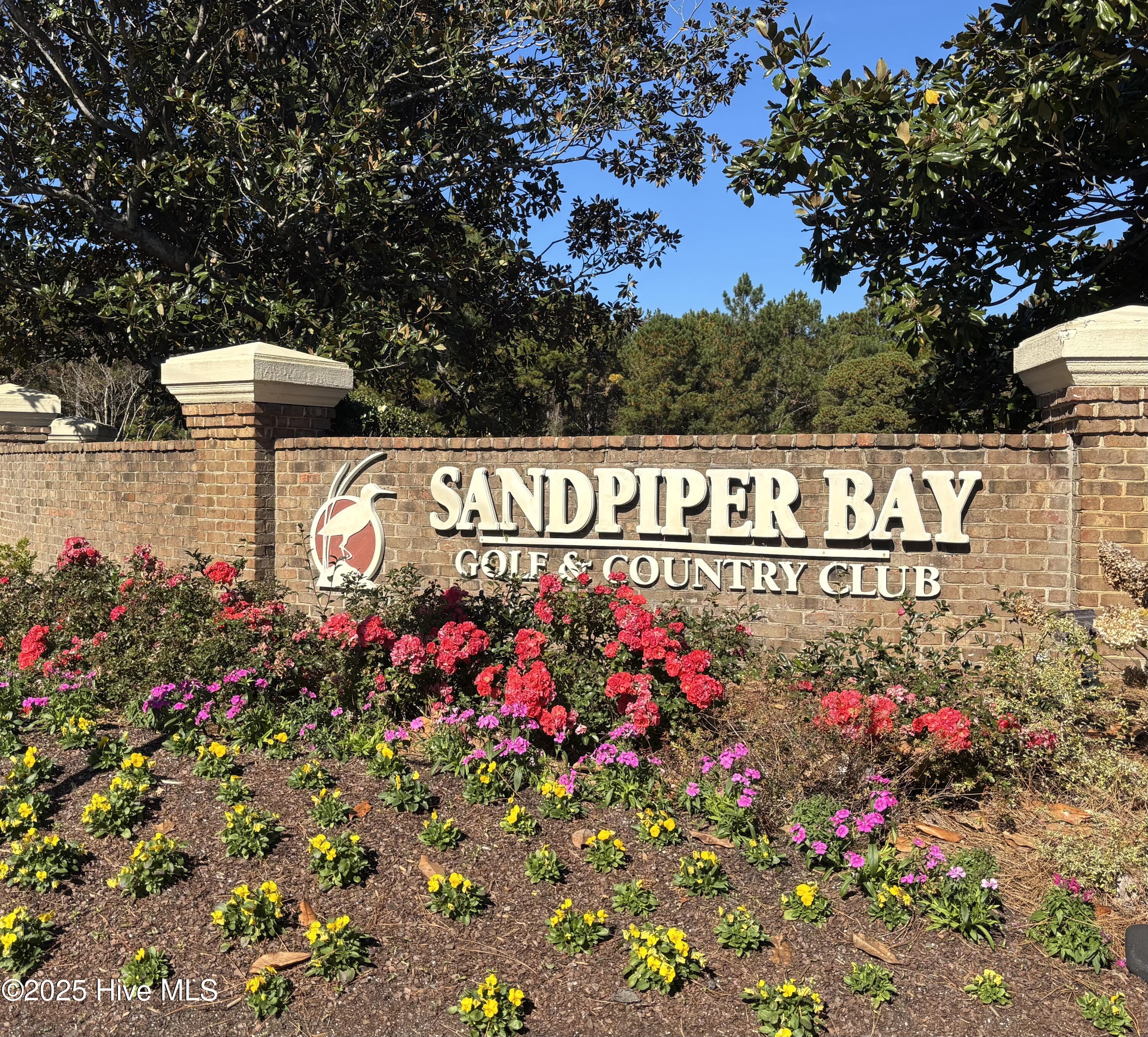 7509 Moorhen Lane Southwest, Unit 52D Sunset Beach, NC 28468 - Photo 30 of 39 Golf & Country club sign pic