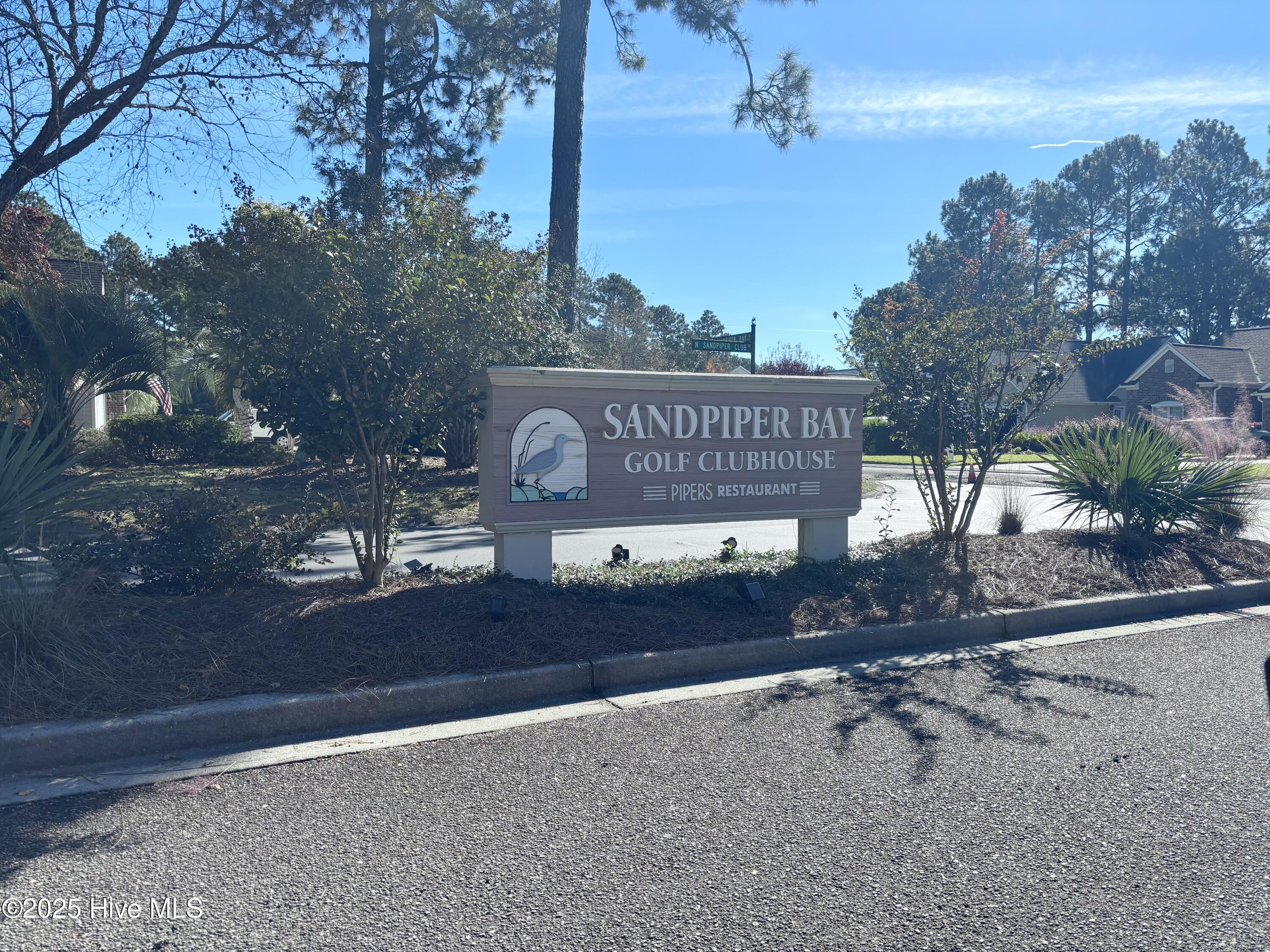 7509 Moorhen Lane Southwest, Unit 52D Sunset Beach, NC 28468 - Photo 32 of 39 Clubhouse sign pic